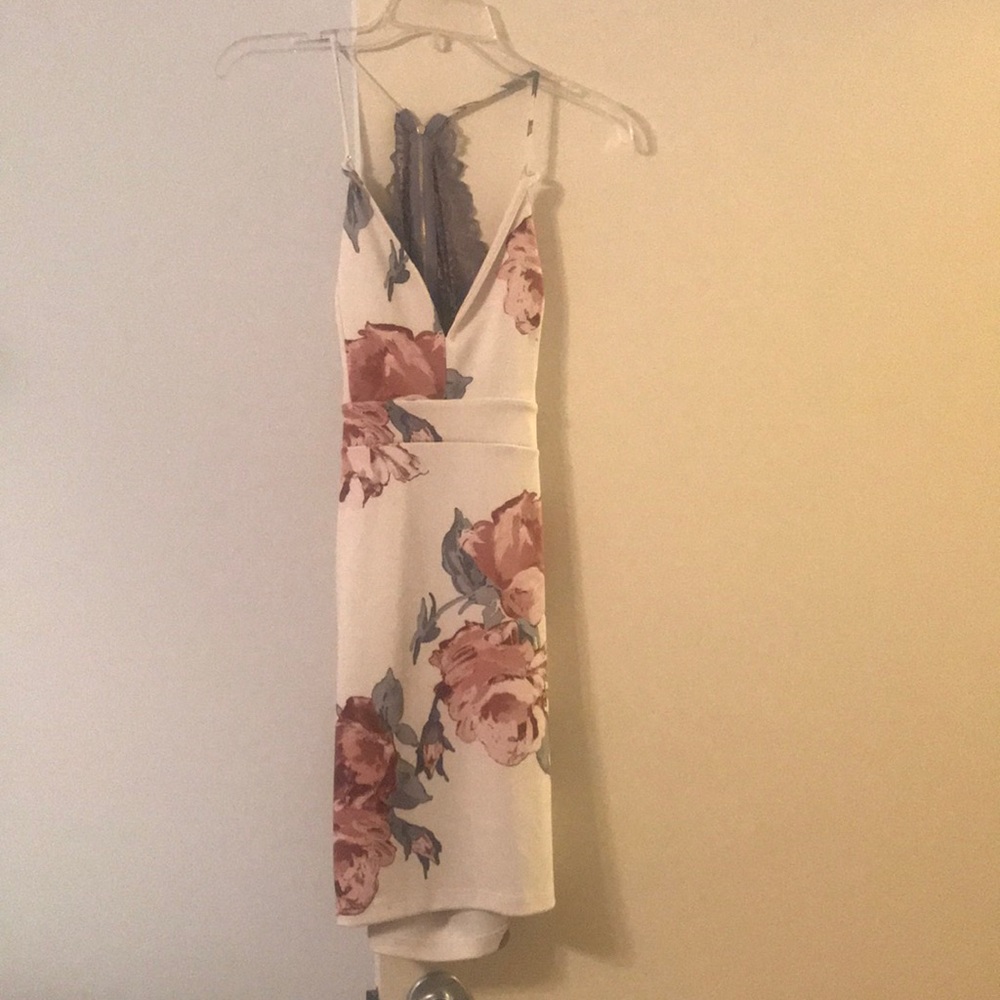 White floral tight fitting dress with lace back
